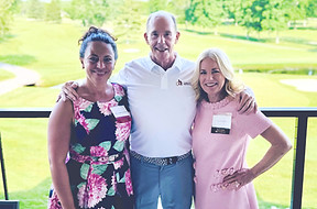 Board and fundraising volunteers at an event