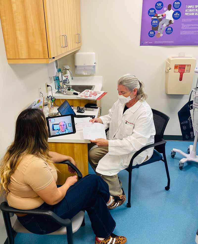 Patient receiving an eye exam through the Vision Program