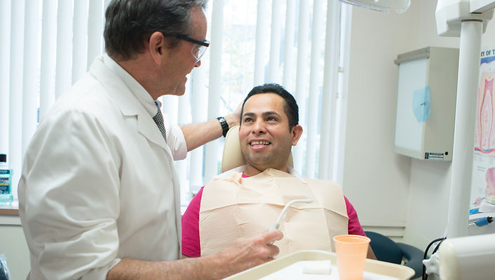 Volunteer dentist providing dental care at the clinic